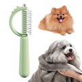 Dinosaur-shaped self-cleaning cat brush with stainless steel bristles in blue, green or white