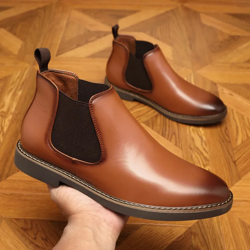 Men's black formal leather boots with a pointed toe and square heel on a non-slip rubber sole.