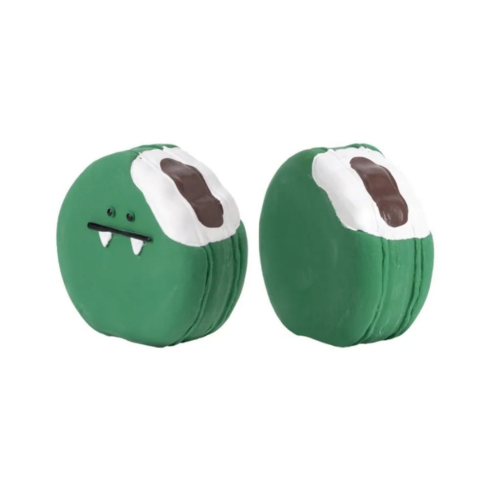 Yellow and green bread-shaped latex dog chew toy with squeaker.