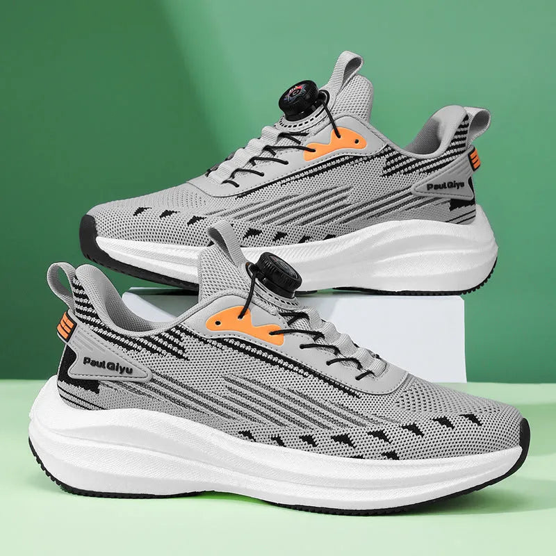 Men's white and green low-top sports shoe with rotating buckle and mesh upper on a flat TPU sole.