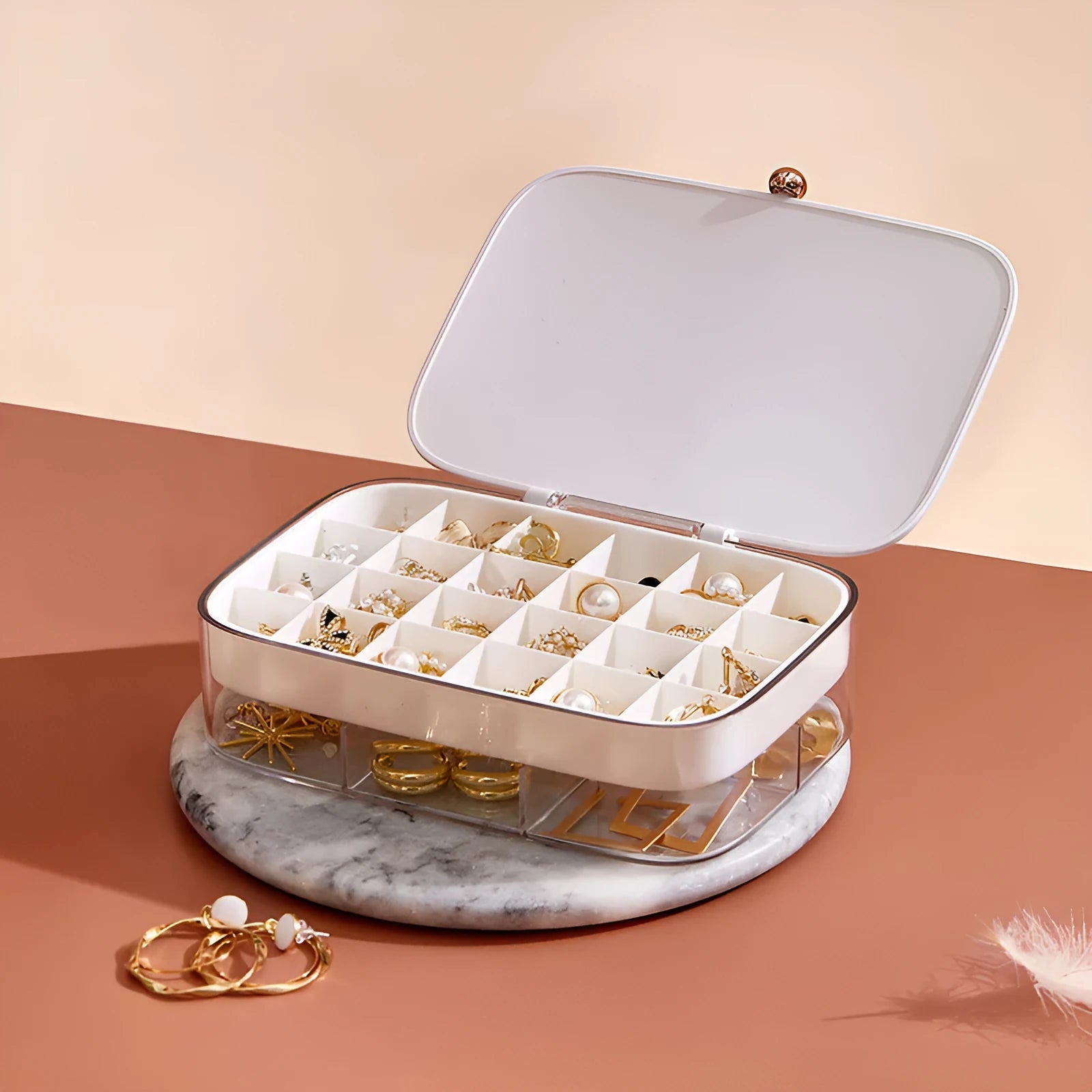 Green minimalist jewelry storage box with multiple layers for organised accessory storage