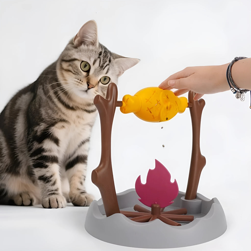 Barbecue-style tumbling cat food feeder with leakage treat dispenser measuring 30cm by 29cm
