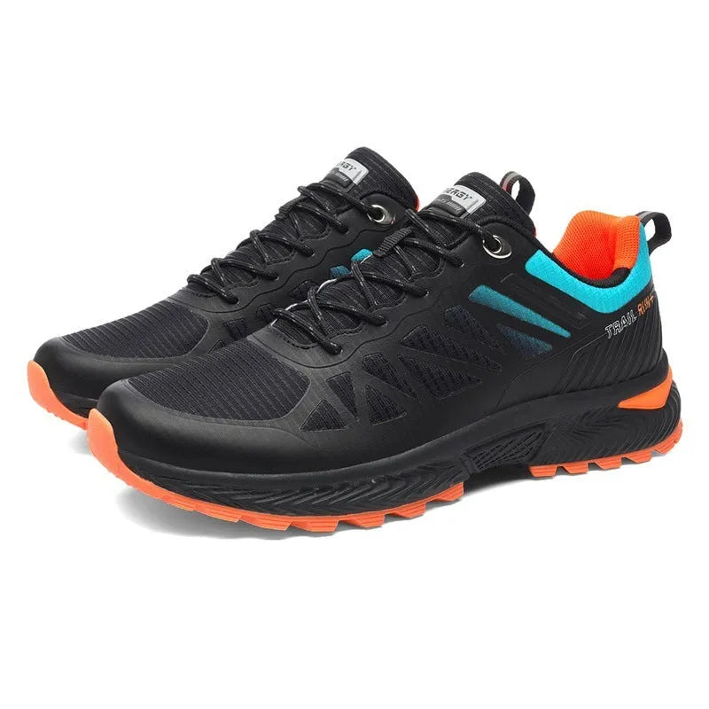 Men's black and orange breathable mesh running shoe with lace-up front and rubber sole