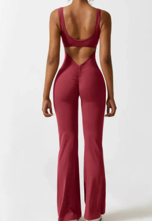 Women's tight seamless yoga bodysuit with hollow-out design and chest padding in black colour