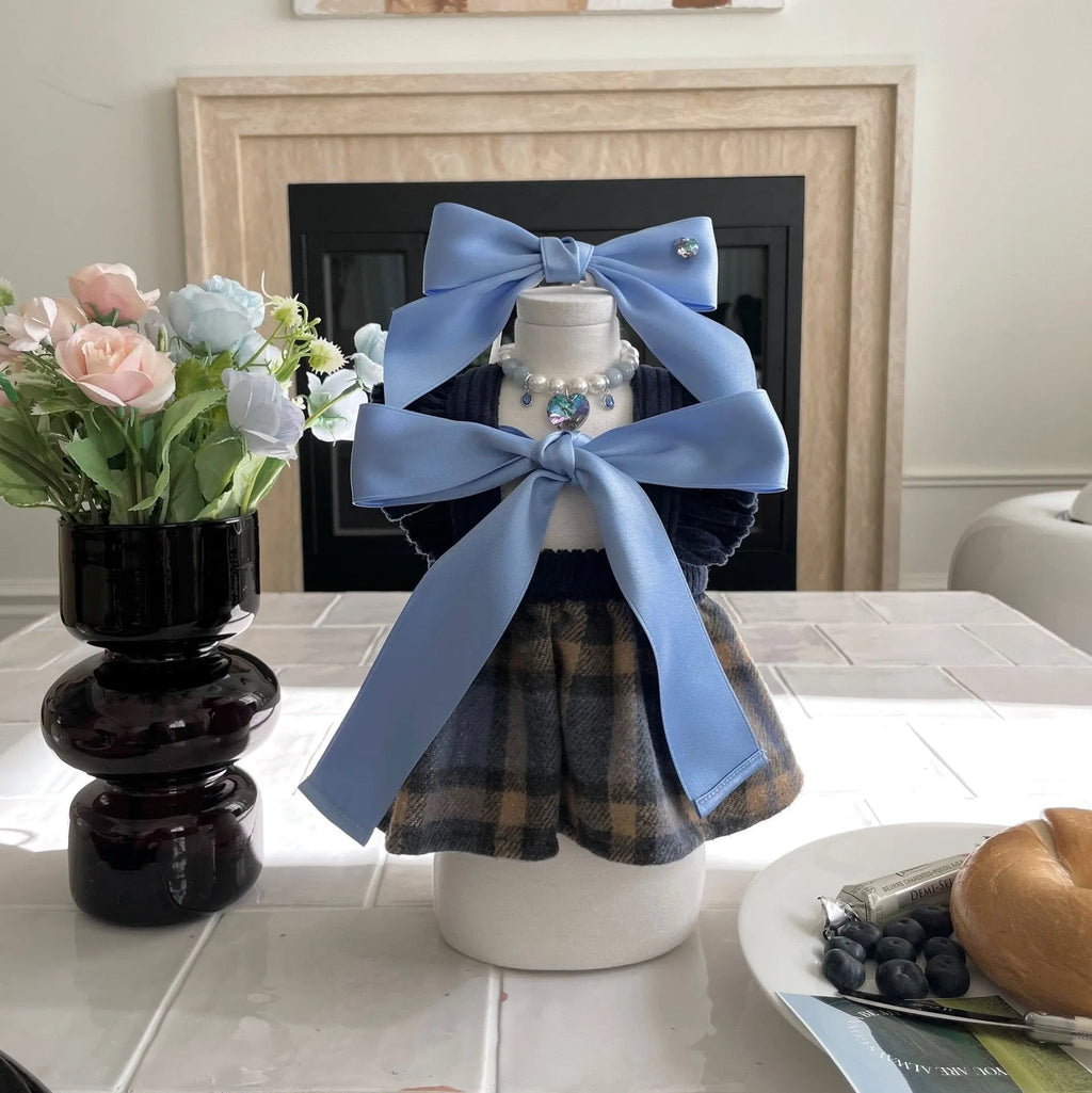 Princess style dog hair band with adjustable bow on canine model showing jacquard fabric detail