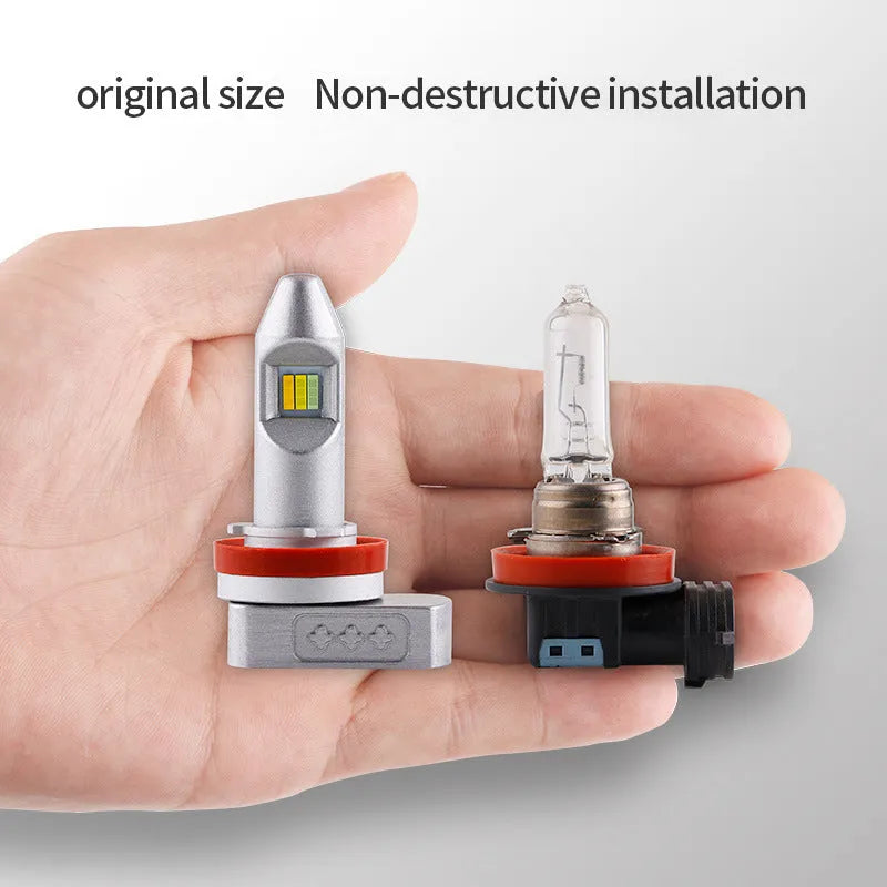 Universal LED fog lamp bulb with aluminium housing on a white background.
