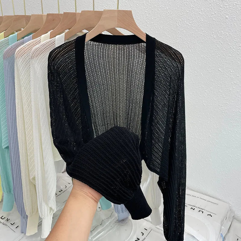 Hollow out lantern sleeve blouse in polyester linen blend fabric shown in apricot colour