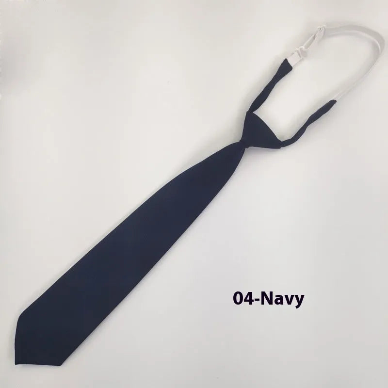 Solid navy blue men's cotton tie with arrow-type design on a white background.