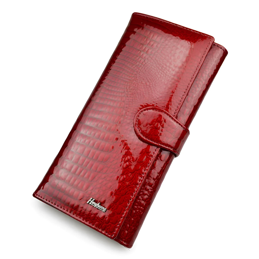 Genuine leather coin purse with patent finish and crocodile pattern in wine red colour