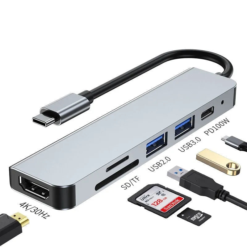 Compact aluminium USB-C expansion dock for laptop and tablet showing multiple port options.