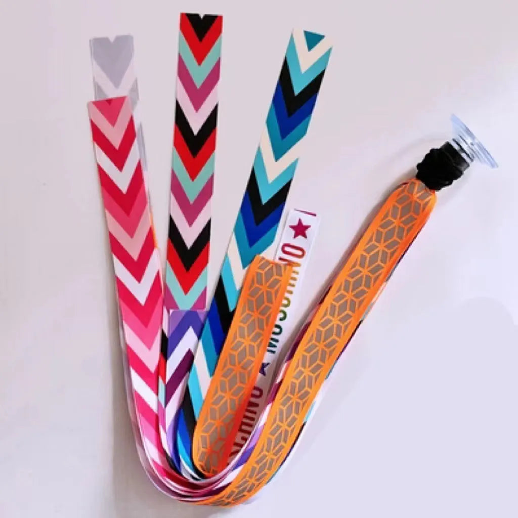 A colourful helmet streamer accessory for children's sports helmets and doll decoration.