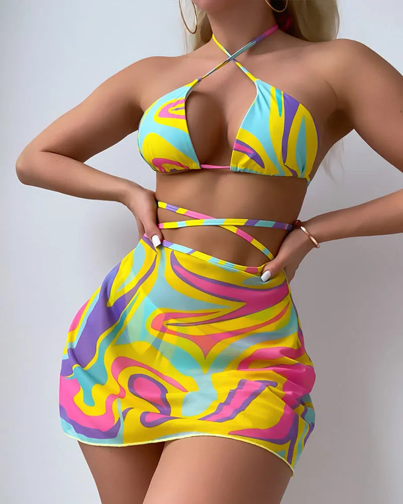 Yellow striped halter lace-up swimsuit set for women, showing top, skirt, and shorts.