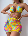 Yellow striped halter lace-up swimsuit set for women, showing top, skirt, and shorts.