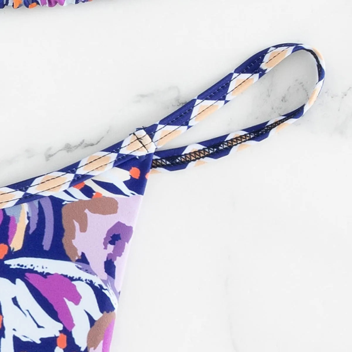 Women's floral print polyester swimsuit with split triangle bag design