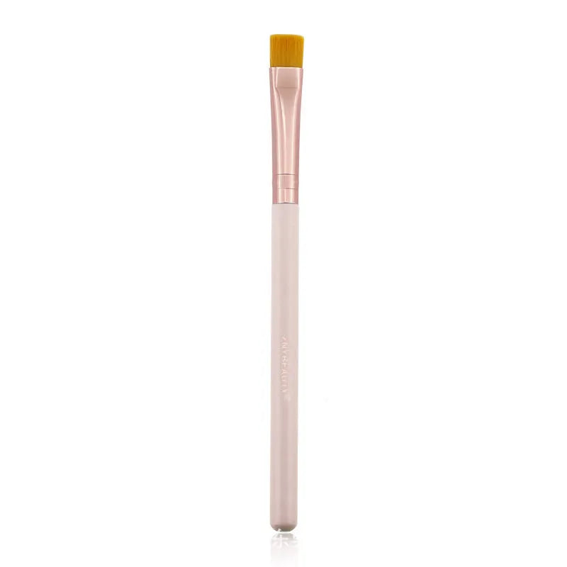 26-piece pink makeup brush set with wooden handles in protective roll case