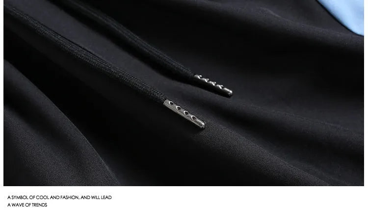 Black and grey quick-drying sports shorts with elastic waistband and loose fit for training