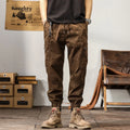 Men's cotton retro harem pants in tapered fit with ankle banding and zip fly