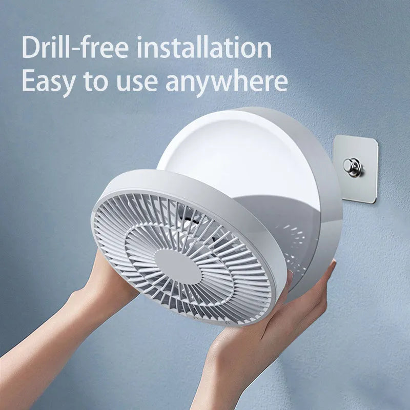 White portable electric fan with remote control showing folded design and night light function