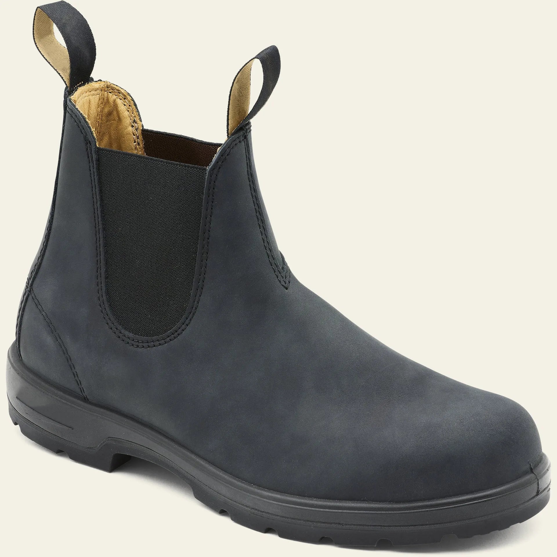 Vintage brown unisex Chelsea boots with a frosted finish, round toe, and low horseshoe heel on a wooden floor.
