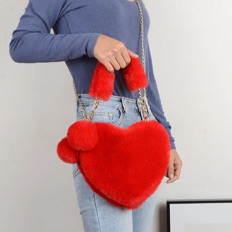 Soft plush heart-shaped women's handbag in medium size with zipper closure