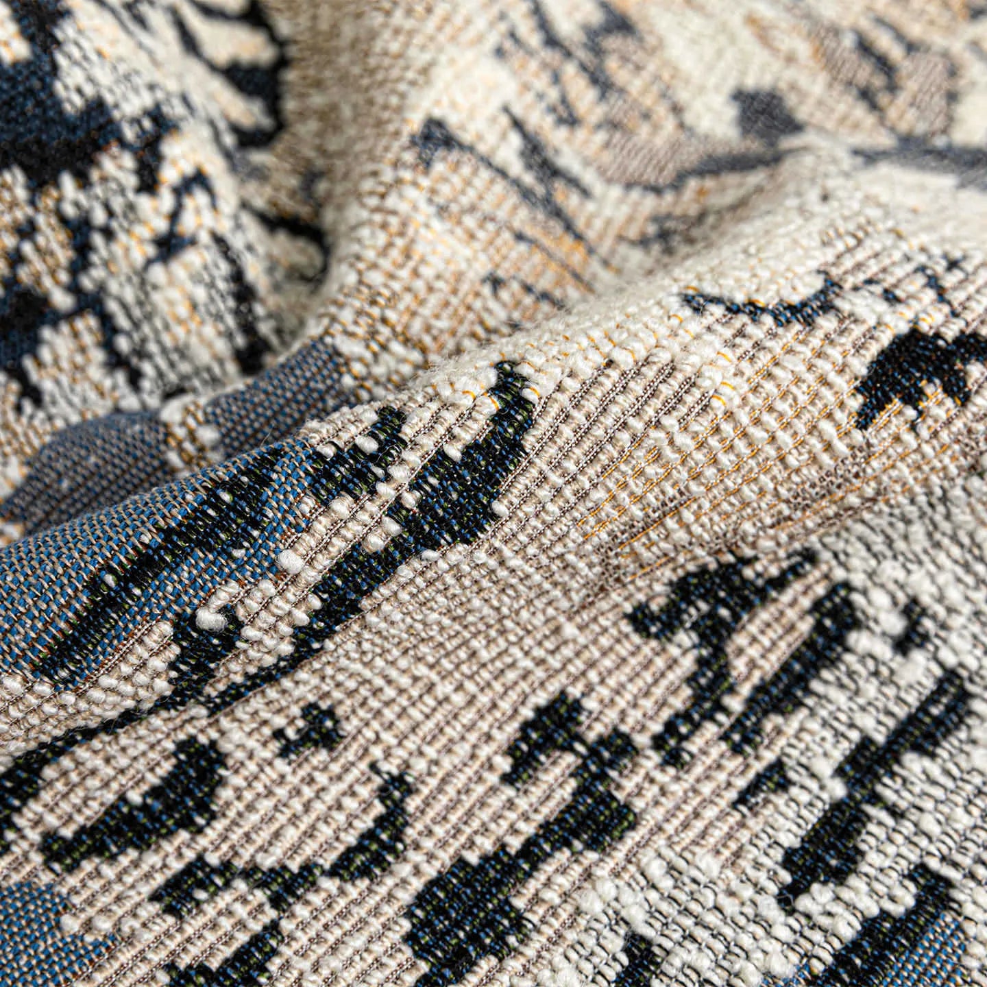 Antique blue abstract floral decorative cushion on wool blend fabric in square and waist sizes.