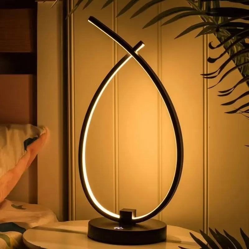 Water drop-shaped desk lamp in black or white with USB touch or mechanical switch measuring 30cm × 14cm