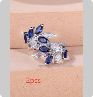 Adjustable copper ring with horse eye zircon stone and leaf design in multiple colour finishes