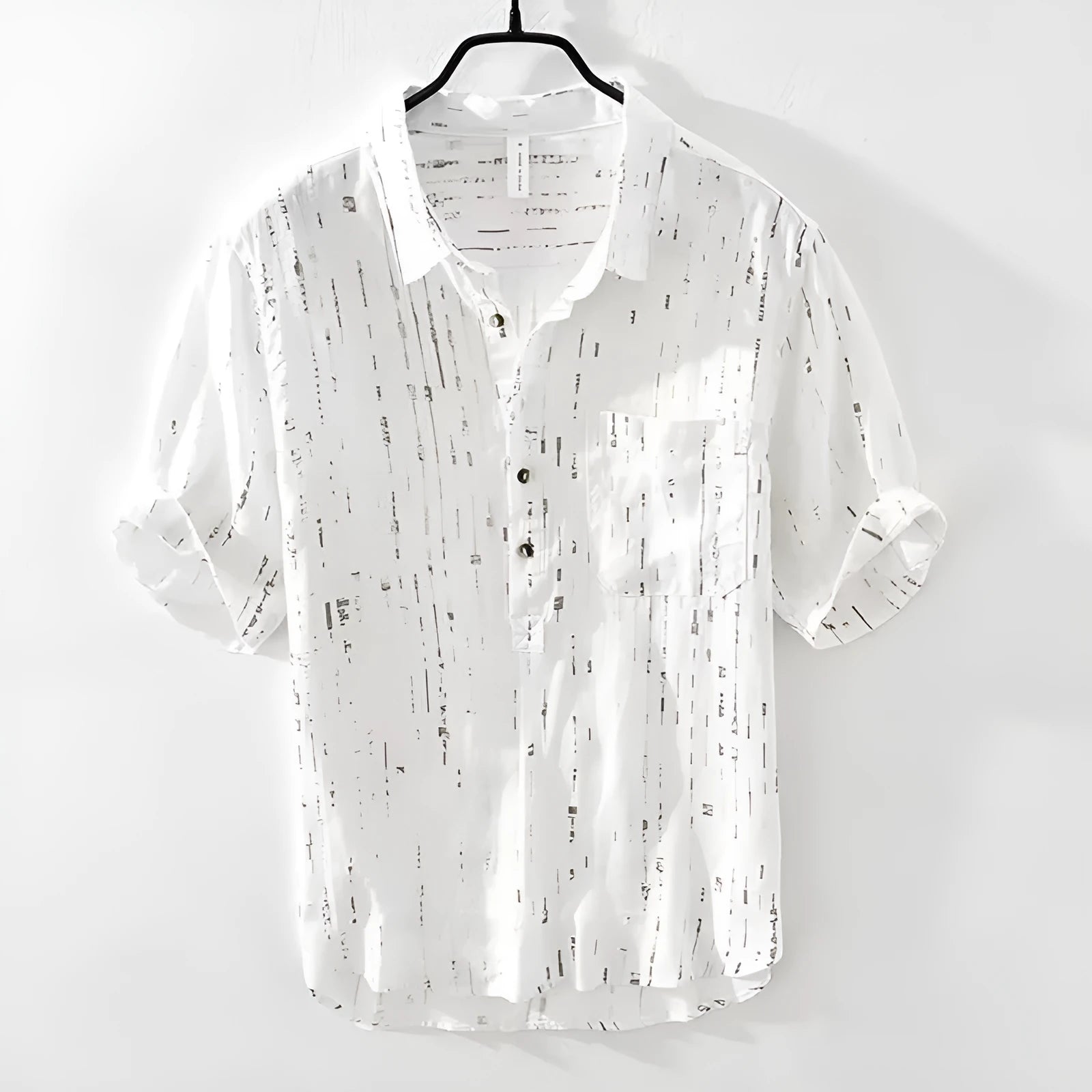Men's loose fit polo shirt in black or white with short sleeves and cardigan style