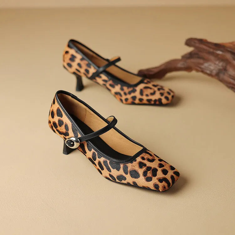 Women's black square toe stiletto ankle-strap heels with a horse hair upper and buckle fastening.