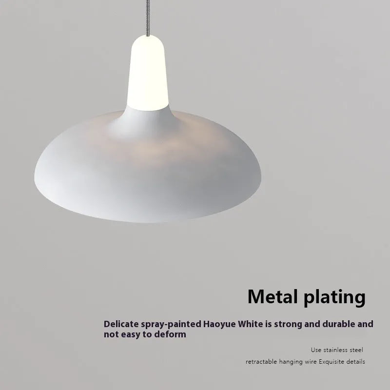 Modern adjustable bedside pendant light in Nordic minimalist design with three light colour options