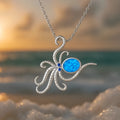 Silver stainless steel octopus necklace with geometric opal inlay detail on box chain
