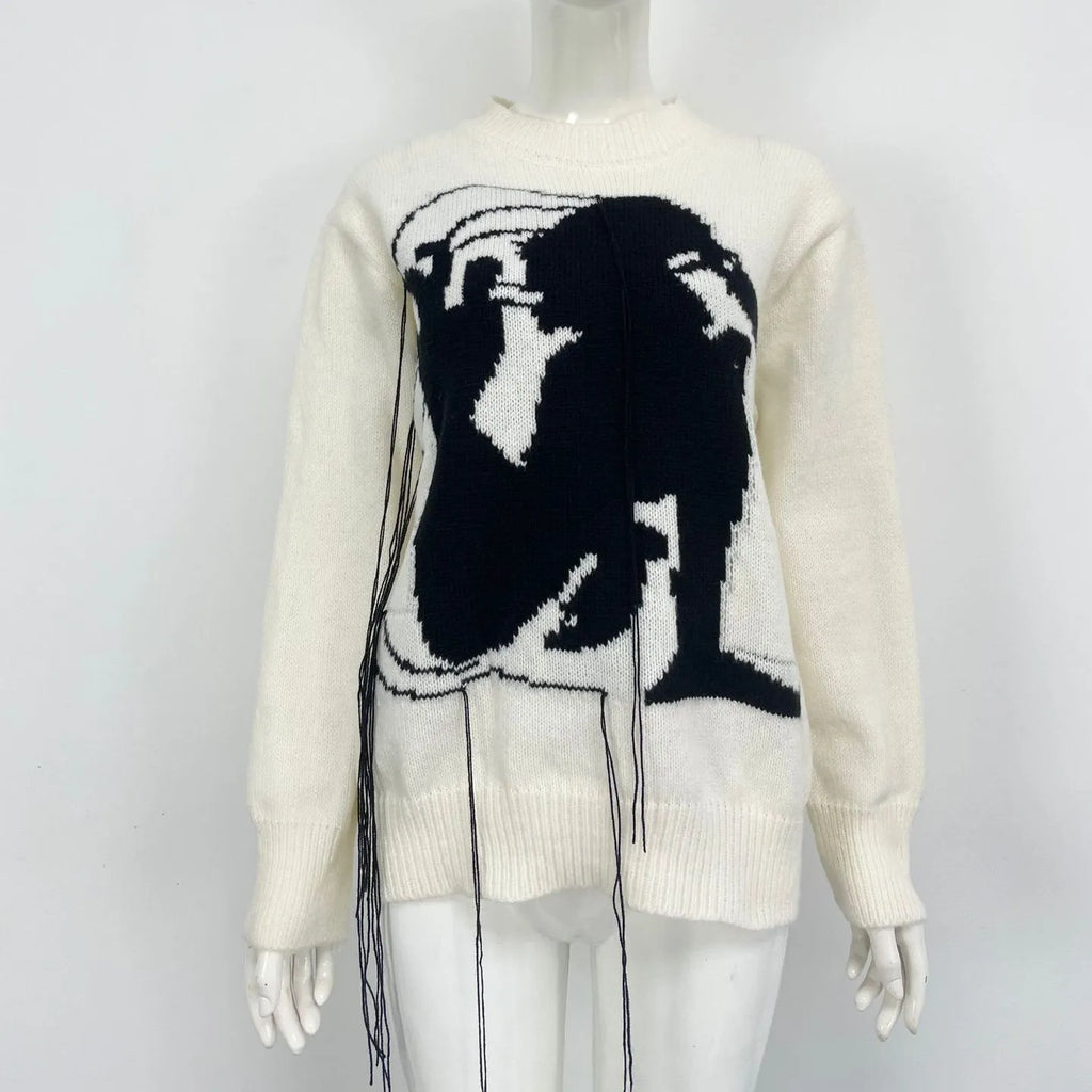 Women's loose fit alpaca wool sweater with tassel design and abstract pattern in street fashion style