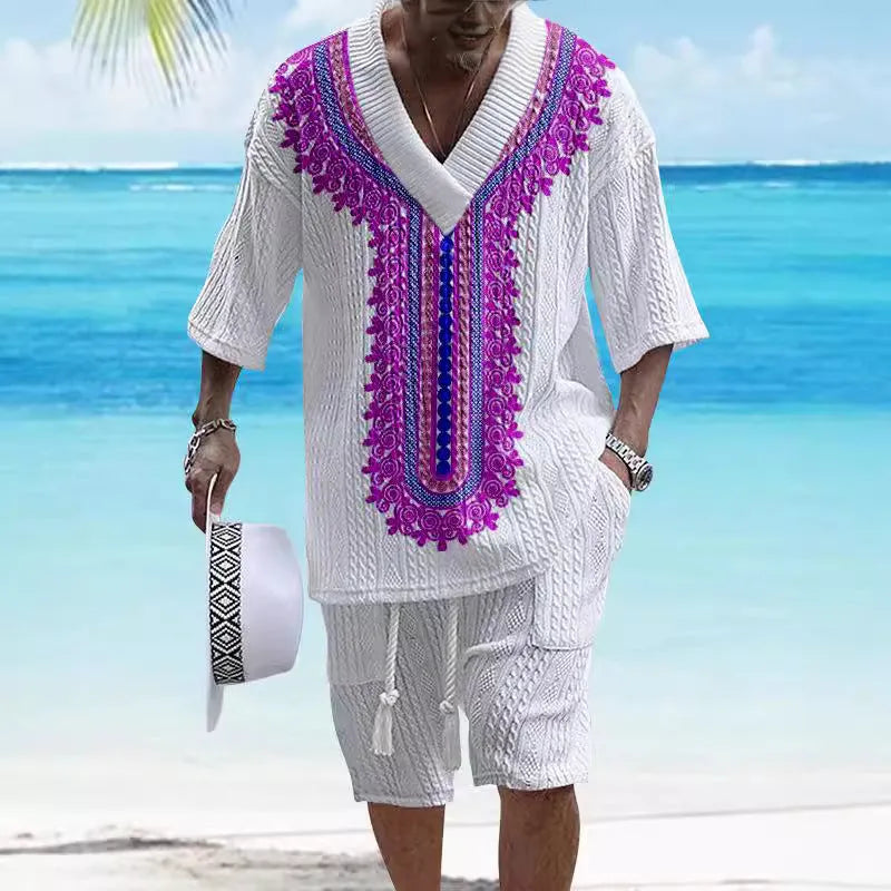 Printed men's knitted drop-shoulder short-sleeved top and matching shorts set in a polyester blend.