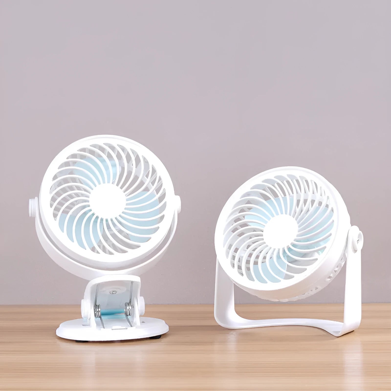 Compact USB desk fan with clip attachment and three blades for quiet personal cooling