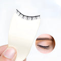 Offwhite plastic mini false eyelash tweezer tool for precise lash application and removal