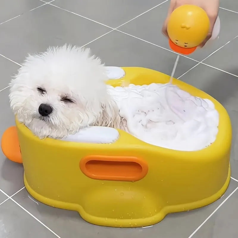 Blue PVC duck-shaped bathtub for washing dogs and cats on a bathroom floor.