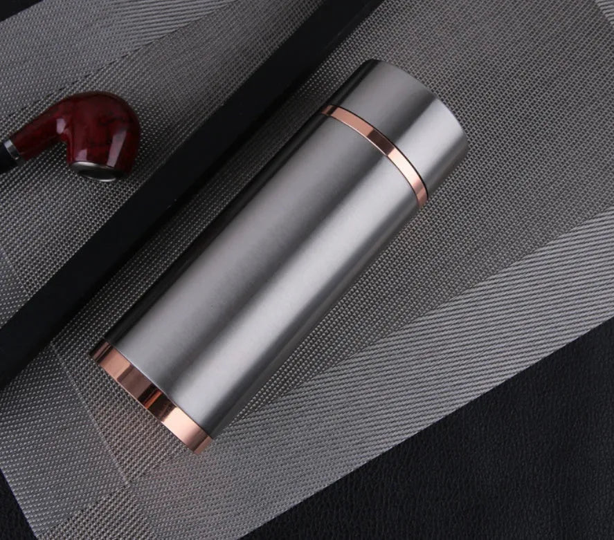 Stainless steel vacuum insulated thermo mug in gold finish with 380ml capacity and silver screw-top lid