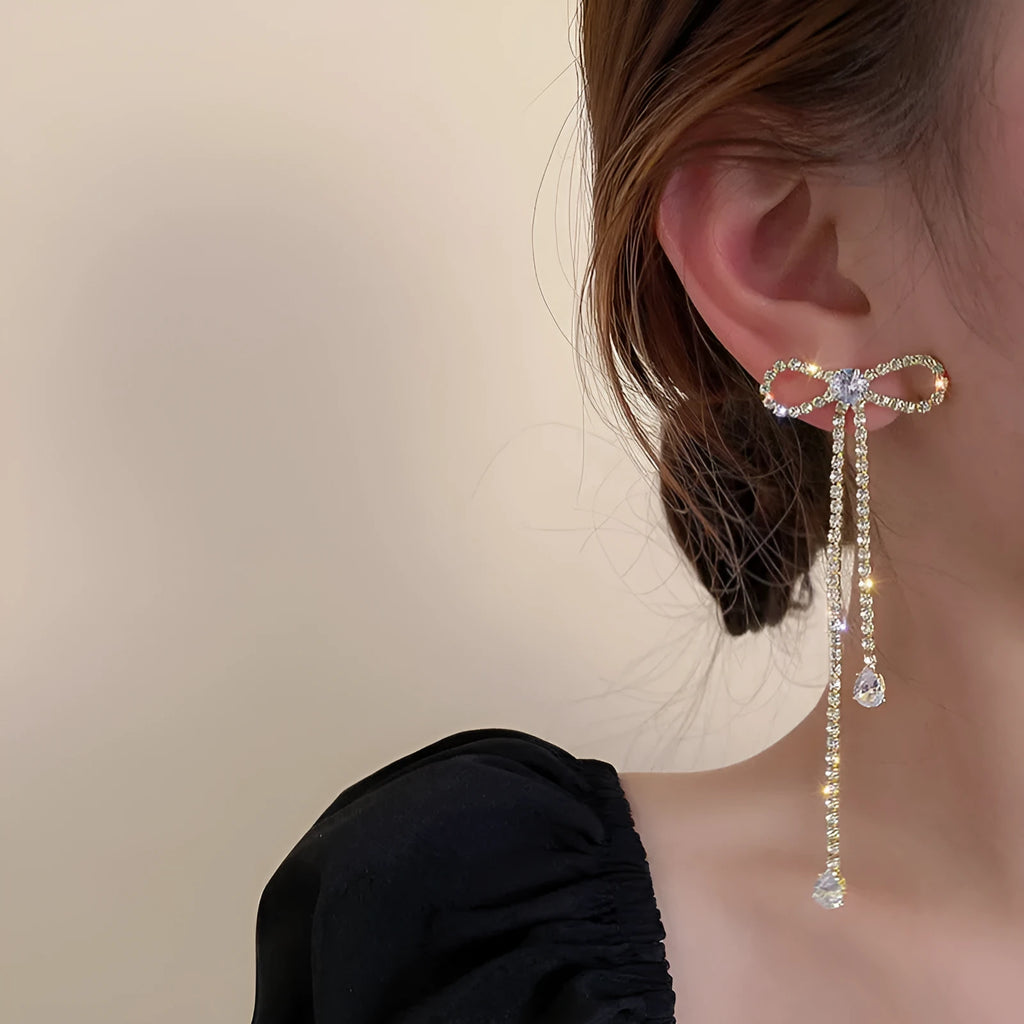 Fashion jewellery silver needle long bow tie full-jeweled stud earrings for women in gold and silver drop shape