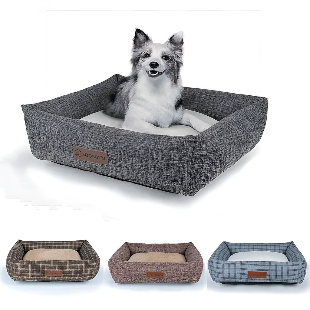 Grey plaid square cloth dog bed for medium-sized dogs on a wooden floor.