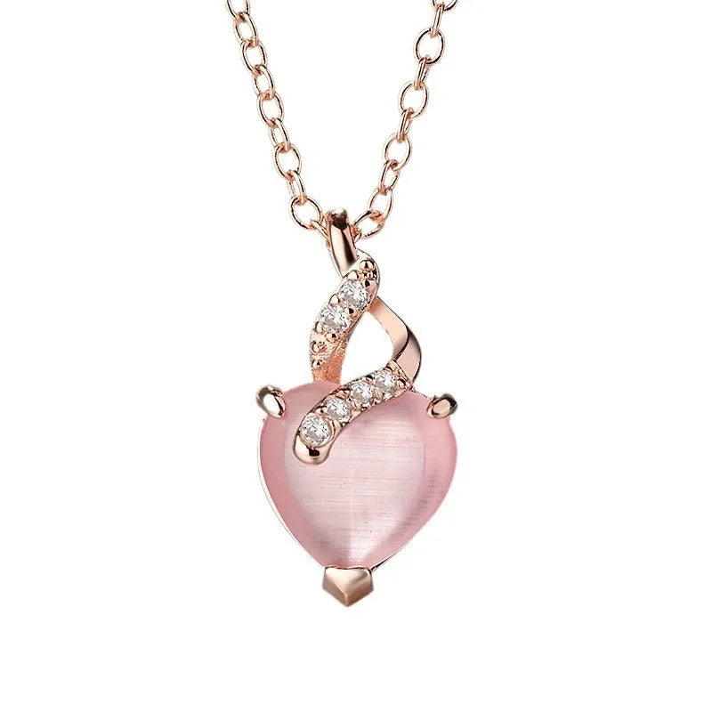 Women's heart-shaped pink artificial crystal pendant necklace with rose gold cross chain