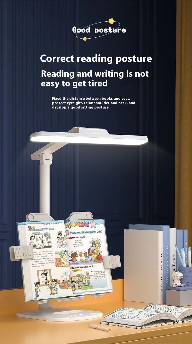 A white adjustable table lamp on a bookshelf with a flexible arm, showing a reading light in use.