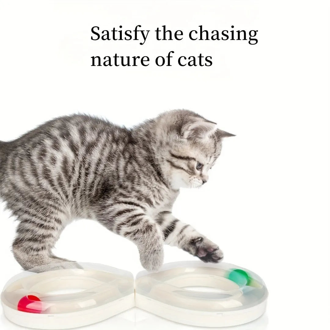 Rotating cat track toy with rolling balls and teasing stick on blue background