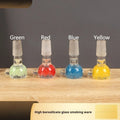 Transparent coloured glass trumpet pipe for cigarettes measuring 7cm in length