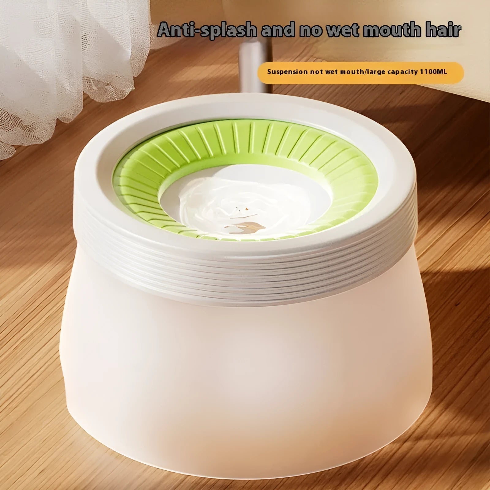Green suspended non-spill water bowl for dogs and cats, showing the elevated bowl above the base plate