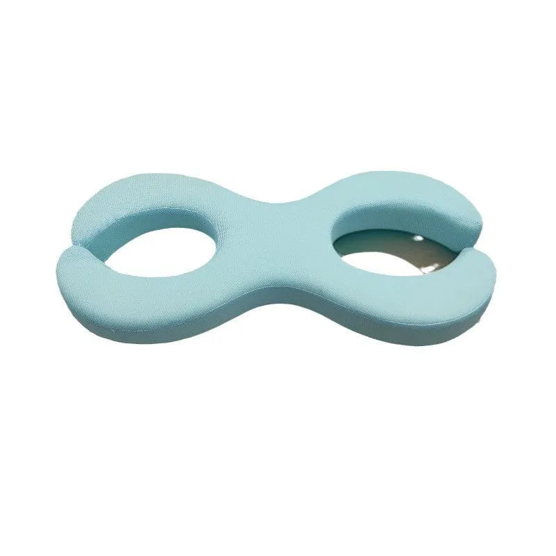 Cylindrical blue memory foam cervical traction pillow showing 6cm and 9cm thickness options
