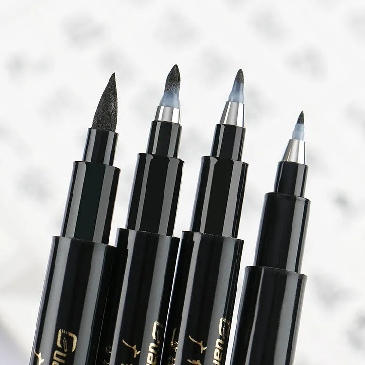 Six soft brush calligraphy pens in various nib sizes, plastic barrels, re-inkable design