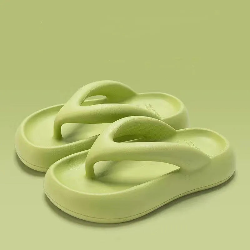 Solid colour thick-soled EVA flip-flops with a bow on the strap, shown on a white background.