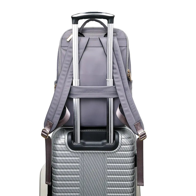 Oxford cloth women's backpack in black or purplish grey with large capacity and waterproof features