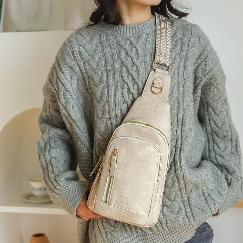 Women's soft PU chest bag in beige with multiple compartments and crossbody strap