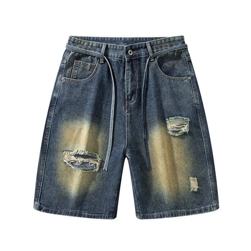 American High Street men's loose fit ripped jeans in retro blue denim showing distressed detail.